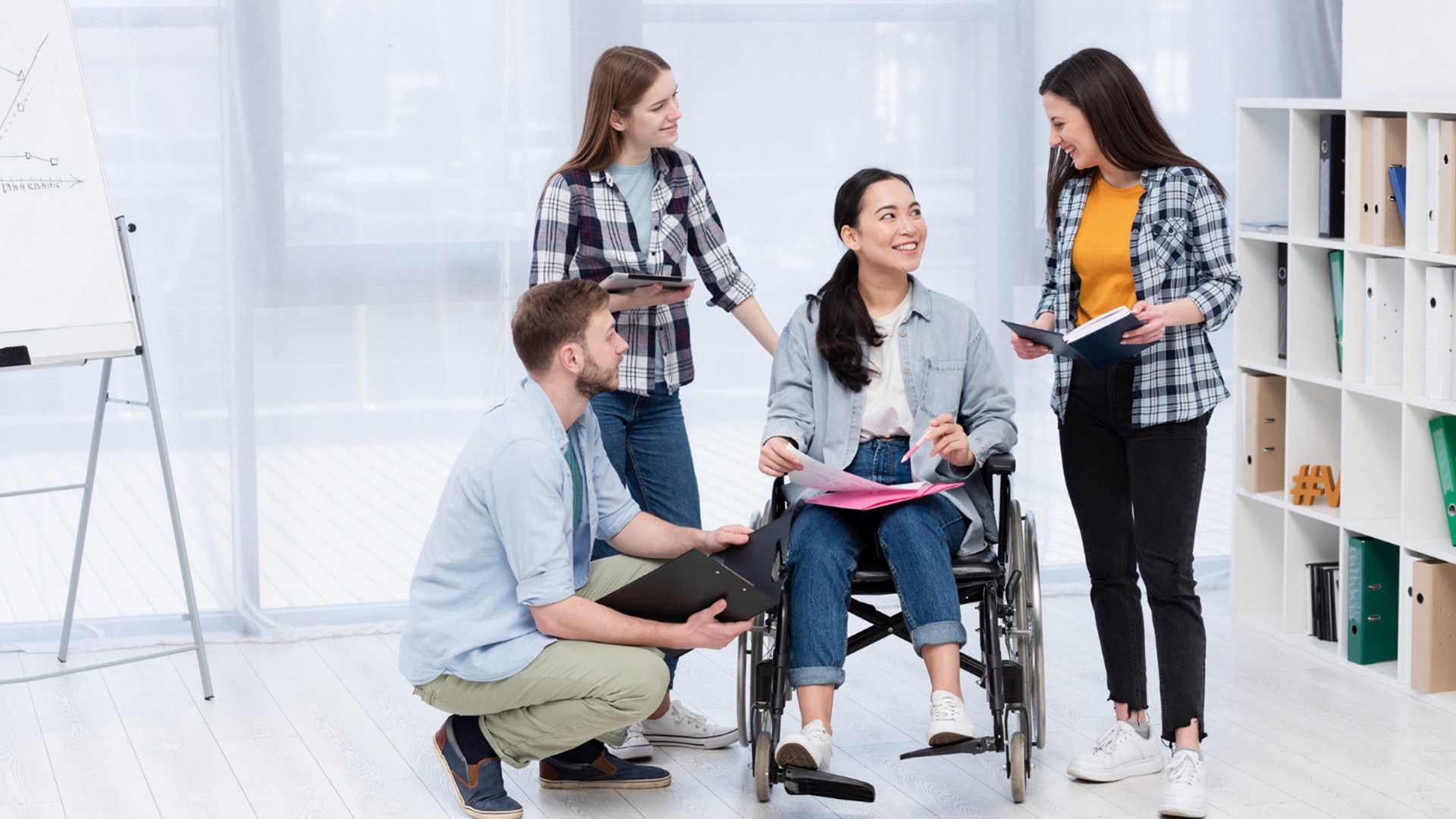 Disability Social Activities with people participating in an inclusive group learning session in a community support center.